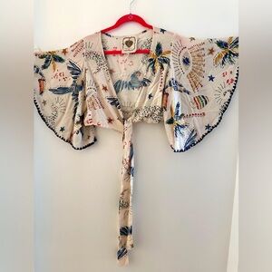 Tulum open top with fun sleeves and tie front!